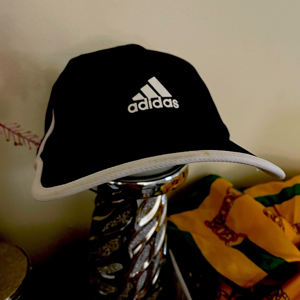 Black and white adidas super lite hat.
